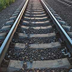 Rails and sleepers railway in perspective