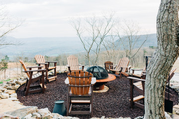 Wooden Chairs Around Outdoor Fire Pit