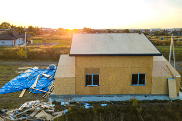 Construction of new and modern modular house. Walls made from composite wooden sip panels with...