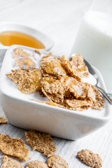 Delicious cereal flakes with milk