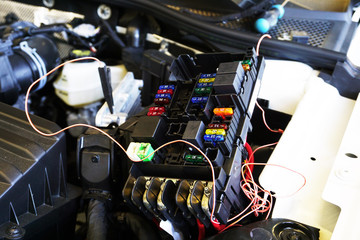 Fuse and relay block of a modern car, repair and diagnostics of electrical equipment of a car....