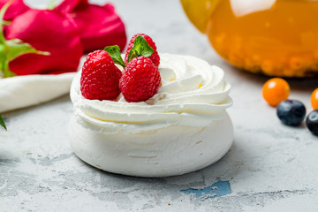 dessert Anna Pavlova with raspberries