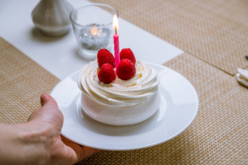 dessert Anna Pavlova with raspberries