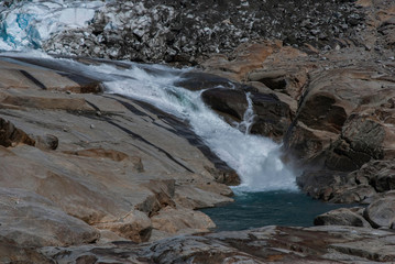 Melting iceberg in Greenland's fjord.