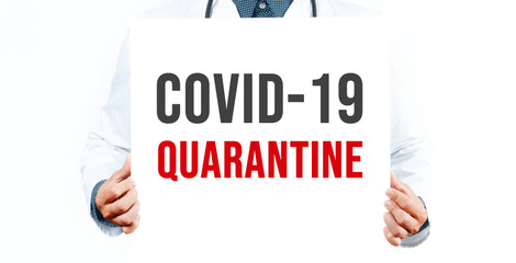 Doctor holding card with stethoscope on wtite background