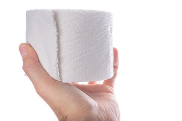 Toilet paper in hand. Male hand with a roll of toilet paper.