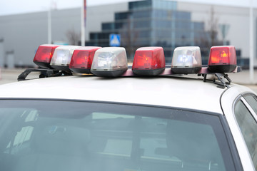 emergency lights on the roof of a police car. police flashing lights close up