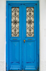 Colored door of a traditional Greek house in Parikia, the capital of Paros island in Greece