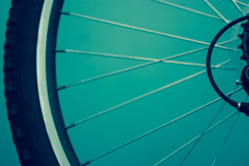 Wheel and spokes of the bike, close-up.