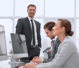 businessman standing in his office