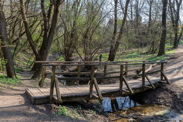 Fototapeta premium Small wooden bridge in the Buda mountains near the village Solymar, Hungary.