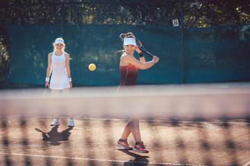 Woman in a tennis double