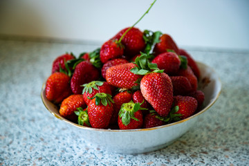 Ripe, juicy strawberries on the table