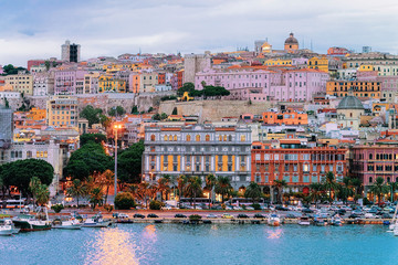 Cityscape with marina in Mediterranian sea Cagliari evening