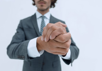 Close up on male clenched hands.