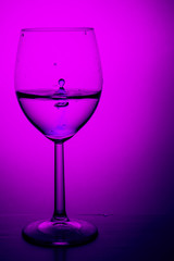 Paint swirling in water.