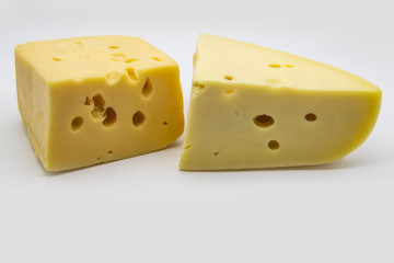Delicious fresh hard cheese on a white background. Healty and very tasty cheese.