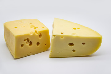 Delicious fresh hard cheese on a white background. Healty and very tasty cheese.