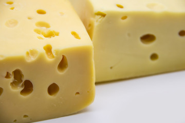 Delicious fresh hard cheese on a white background. Healty and very tasty cheese.