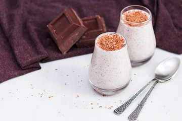 Chocolate chia pudding in glass. Healthy organic snack with omega 3.