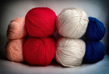 Multi-colored tangles of yarn with a dedicated center framed