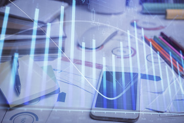 Double exposure of forex graph drawing and cell phone background. Concept of financial data analysis