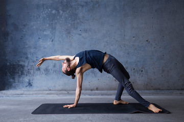 Fototapeta na wymiar Man practicing yoga