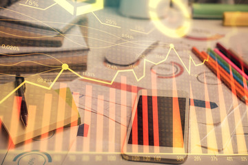 Fototapeta premium Double exposure of forex chart drawing and cell phone background. Concept of financial data analysis