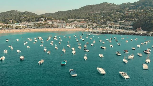 Spain Costa Brava Mediterranean coastline panning from the sea shore, Canyelles Grosses, Roses, Catalonia