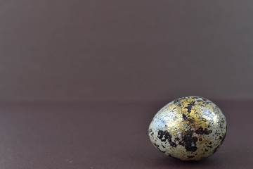 A golden egg. Easter egg. Modern Easter eggs.