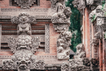 Sculptures of gods and demons carved from stone.