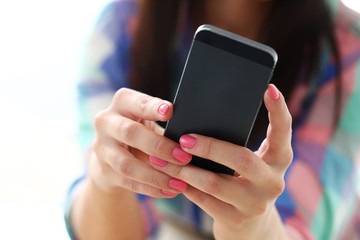 Beautiful girl with mobile phone