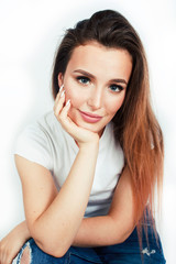 young pretty teenage hipster girl posing emotional happy smiling on white background, lifestyle people concept