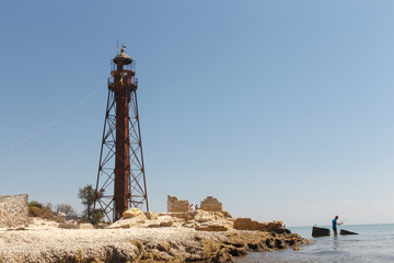old eifell lighthouse on the seaside in Ukraine