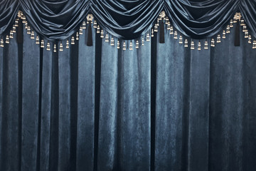 Blue velvet curtains as background or backdrop.