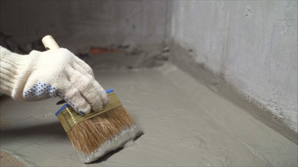The process of applying mortar - waterproofing to a concrete floor. The concept of waterproofing...