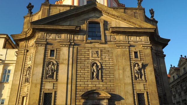 Church of saint Francis of Assis near Charles Bridge in Prague, Czechia. 4K Tilt down. 