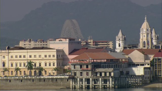 Aerial view of the old town of Panama City, Plaza de Francia, the old church and the national theater with the bridge of the Americas in the background