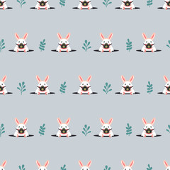 Seamless pattern with rabbits in respirators. Vector flat illustration.