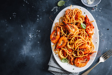 Pasta spaghetti with tomato sauce and shrimps
