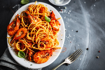 Pasta spaghetti with tomato sauce and shrimps