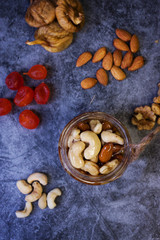 Jar with honey and nuts, on a white background