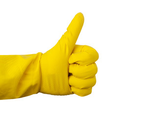 Yellow rubber glove for cleaning shows a gesture on a white