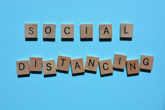 Social Distancing, words on blue background
