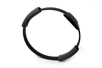 A grey exercise ring to stay fit. Device used with videogame controllers.