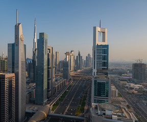 Dubai from above 43th floor . Dubai skyline on sunset. United Arab Emirates, may 2019