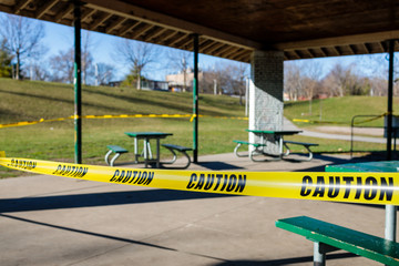 Caution tape around park facilities in Toronto