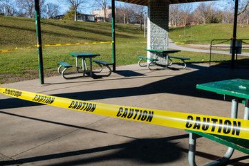 Caution tape around park facilities in Toronto