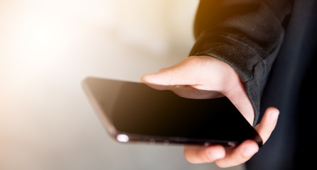 Attractive Asian man uses their smartphones to order food, and gadgets online. the epidemic incidents, Coronavirus, Virus, Covid-19, COVID 19, COVID19.