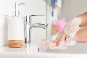 Hygiene concept. Woman washing hands close up. Hand hygiene for coronavirus outbreak. 